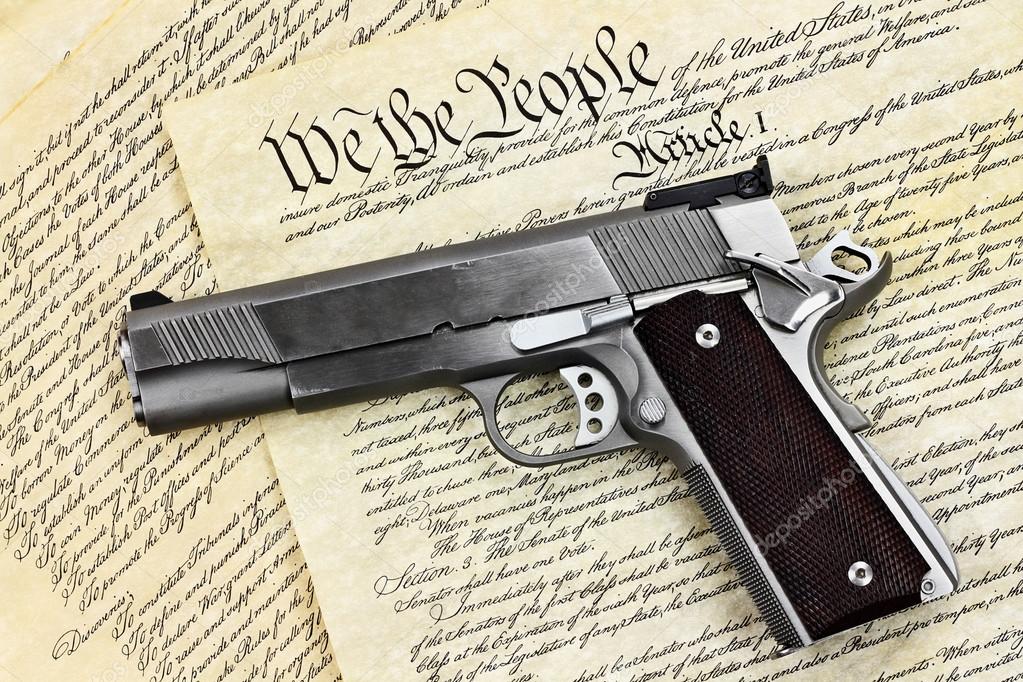 Hand Gun and Constitution Stock Photo by ©StephanieFrey 119548054