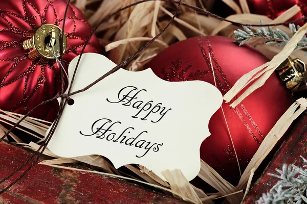 Happy Holidays Tag en Kerst ornamenten — Stockfoto