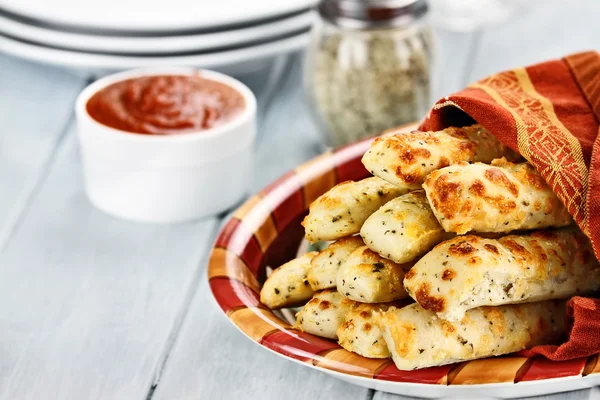 Cheesy Asiago Breadsticks and Marinara Sauce — Stock Photo, Image