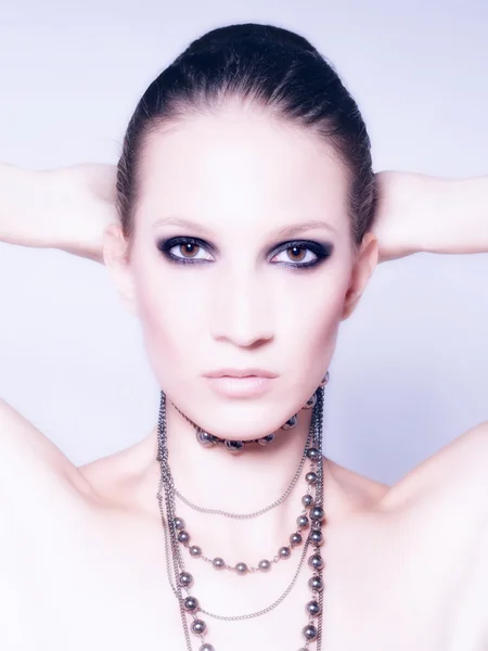 Portrait of beautiful fashionable girl posing in studio — Stock Photo, Image