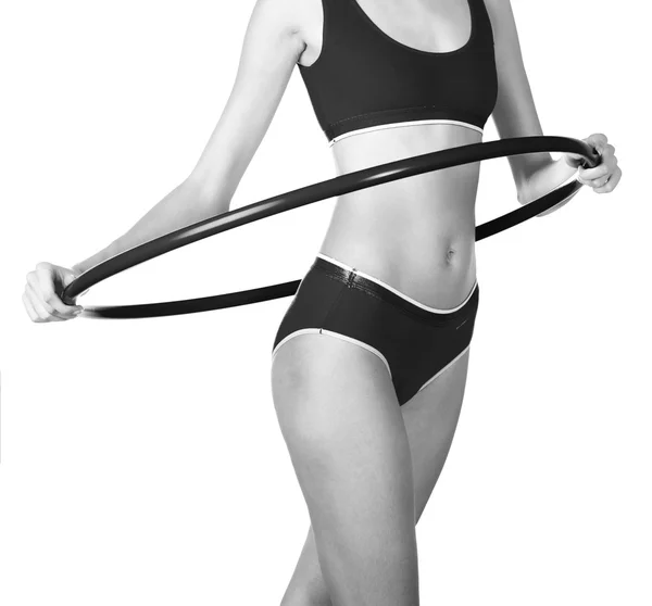 Young woman exercising with hula hoop — Stock Photo, Image