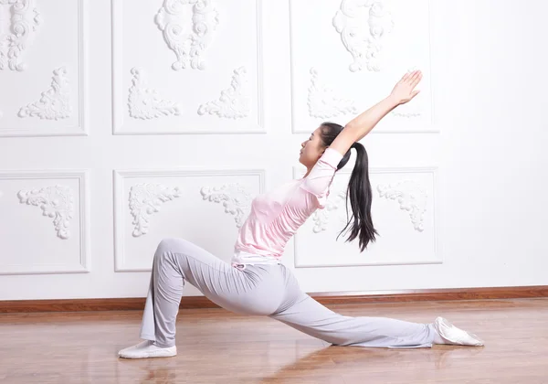 Yoga exercise indoors — Stock Photo, Image