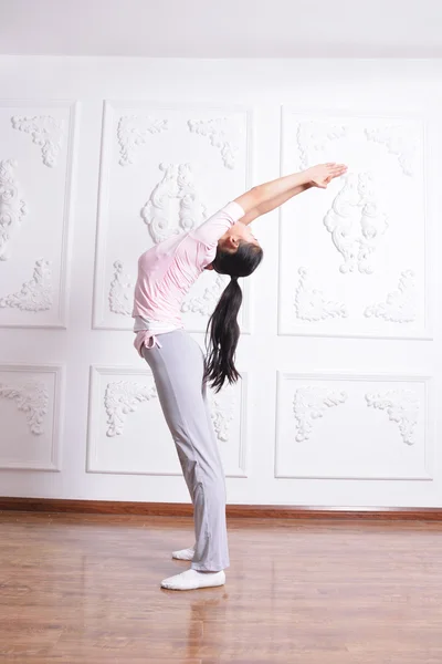 Yoga exercise indoors — Stock Photo, Image