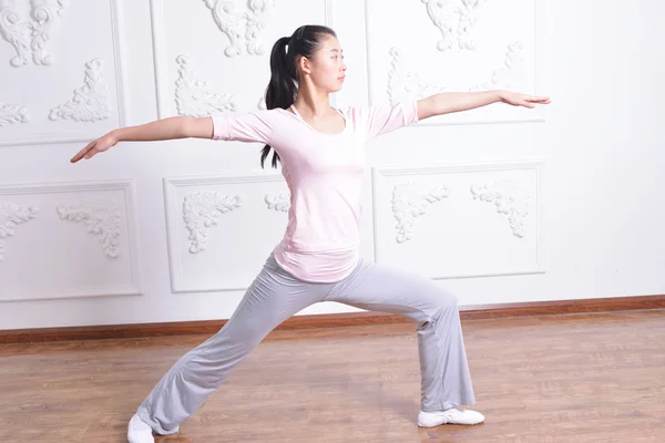 Yoga exercise indoors — Stock Photo, Image