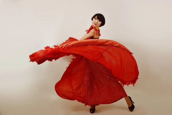 Červené šaty dívka — Stock fotografie