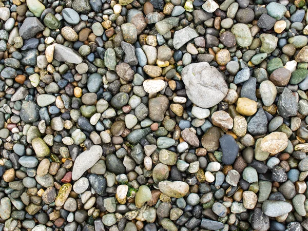 Каменный галечный фон — стоковое фото
