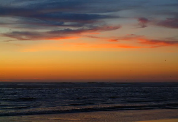 Sahilde gün batımı — Stok fotoğraf