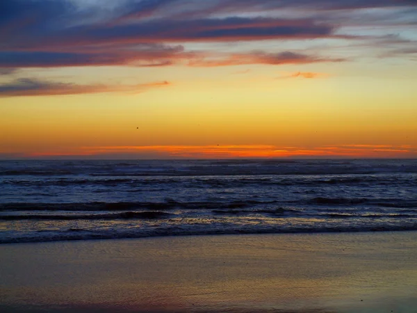 Puesta de sol en la playa — Foto de Stock