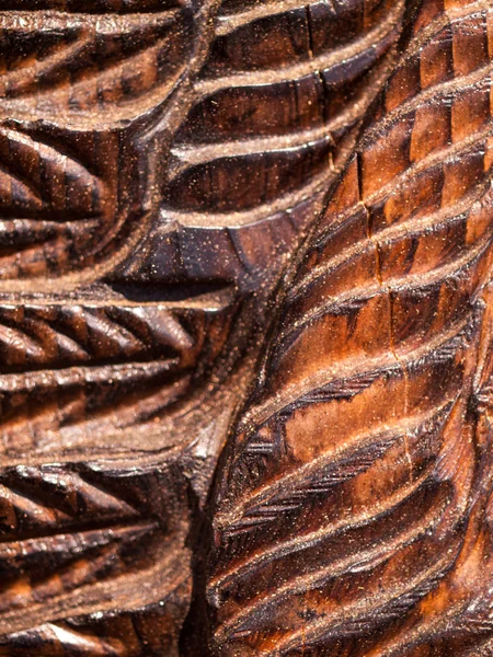 Textura de madera tallada y quemada de la escultura de motosierra —  Fotos de Stock