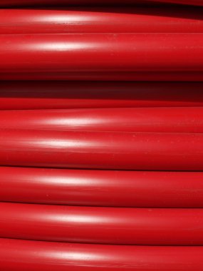 Closeup büyük kırmızı hortumlar bobinleri