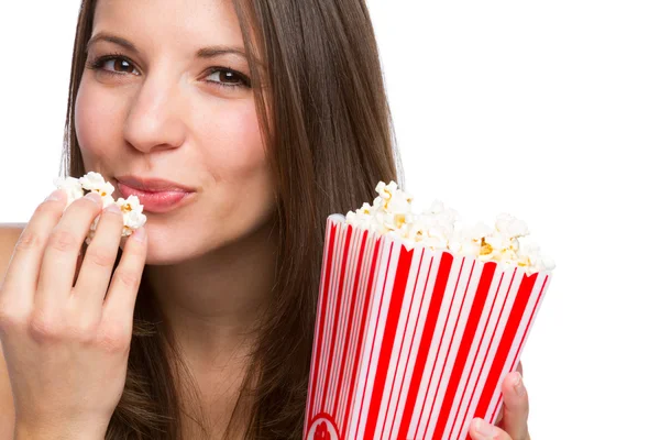 Meisje eten popcorn — Stockfoto