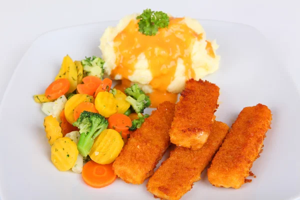 Fish fingers with mashed potatoes and vegetable — Stock Photo, Image