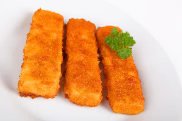 Fish fingers on a plate — Stock Photo, Image