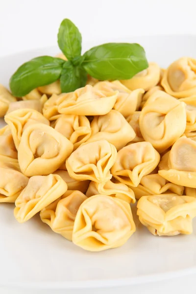 Raw Tortellini on a plate — Stock Photo, Image