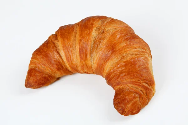 Croissant s bílým pozadím — Stock fotografie
