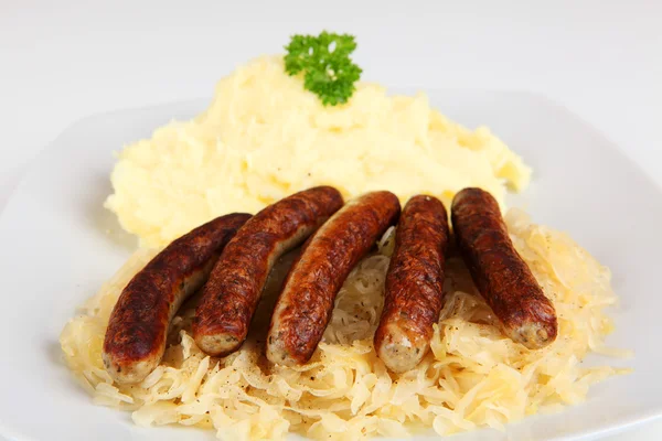 Sauerkraut und Wurst — Stockfoto