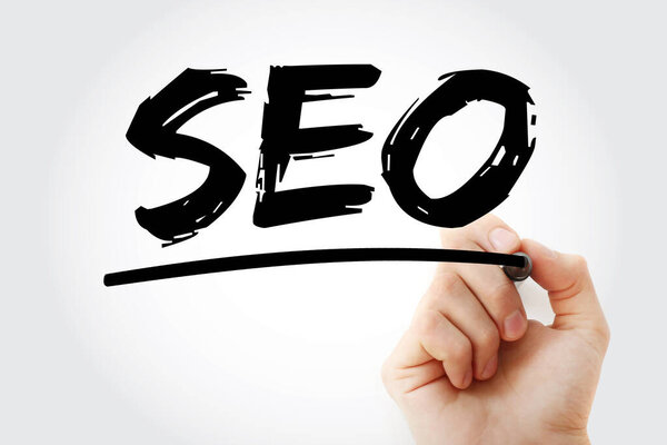SEO (Search Engine Optimization) acronym text with marker, business concept background