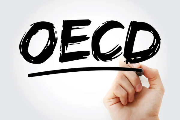 OECD - Organisation for Economic Co-operation and Development acronym with marker, business concept background