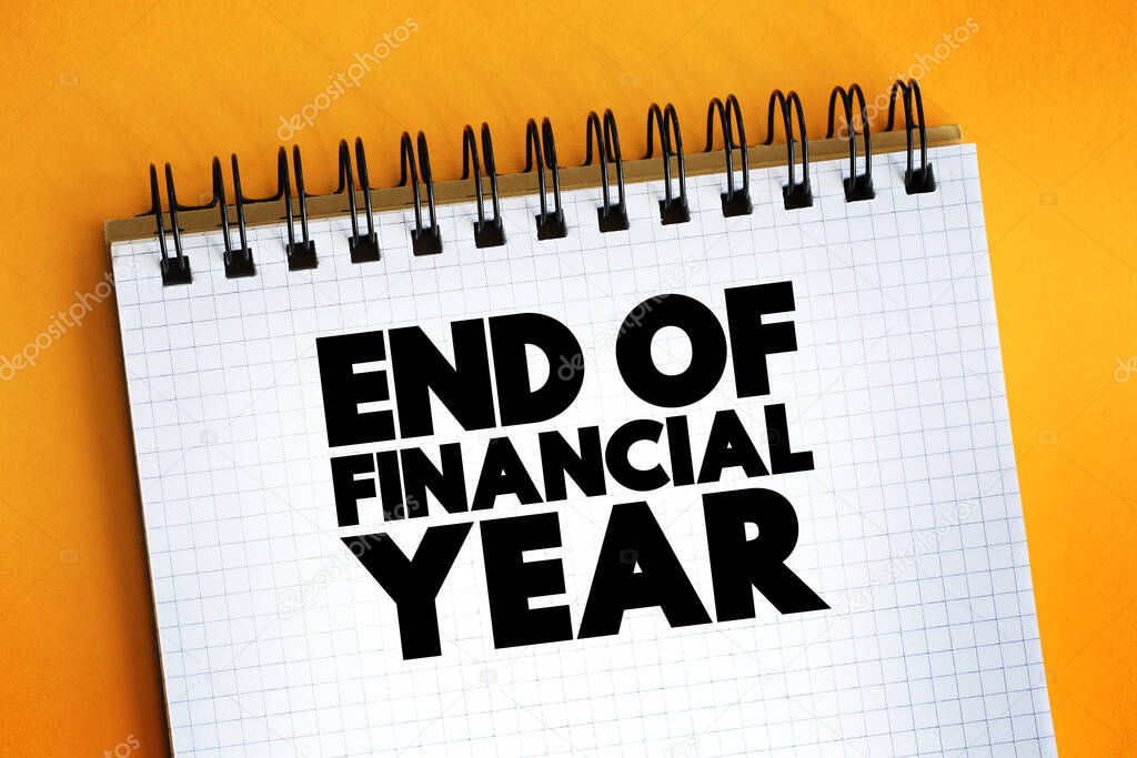 End Of Financial Year text quote on notepad, concept backgroun