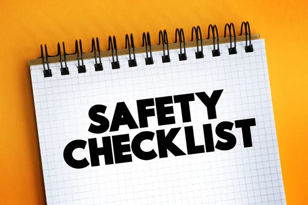 Safety Checklist text on notepad, concept backgroun