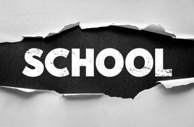 School concept in strong bold text under torn paper background symbolizing education, knowledge, learning, study, growth, and development for success and lifelong improvement