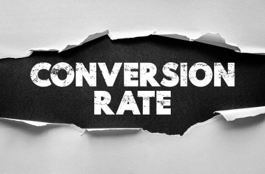 CONVERSION RATE concept image with torn paper and bold text representing marketing performance, optimization, analytics, and digital strategy for business growth and success