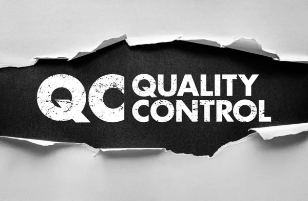 QC Quality Control message visible under ripped paper symbolizing inspection, production process, product assurance, performance check, manufacturing, and management system for reliability