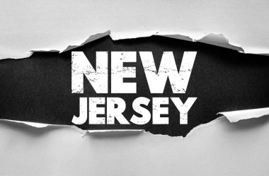 New Jersey metni yırtık kağıt arkaplan tasarımı üzerine. Yırtık efektli Grunge tipografisi ve seyahat, varış yeri veya yaratıcı konsept için kalın harfler.
