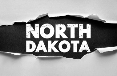 Yırtık kağıt arkaplan üzerine Kuzey Dakota metni Cesur sıkıntılı tipografi ve vintage yerleşim
