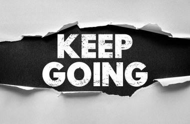 Sözcükler kâğıda dökülmeye devam etsin. Motivasyon mesajı, zorluklara rağmen inatçılık, dayanıklılık, adanmışlık ve hedeflere ve başarıya yönelik sürekli çabayı teşvik eder.