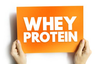 Protein metni elle tutulur. Sağlığı, enerjiyi ve kas gelişimini sembolize eden gıda ve fitness konsepti, destek ve vücut geliştirme ürün teması