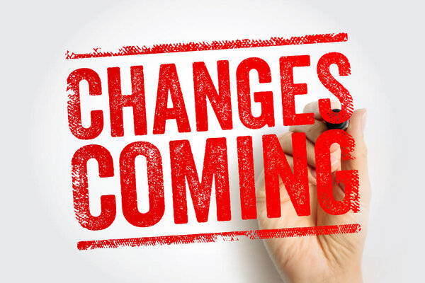 CHANGES COMING displayed in stamp textured lettering with a hand writing the phrase, conveying transformation, updates, transitions, business announcements, strategic planning, and upcoming developments
