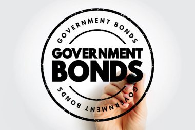 Devlet tahvilleri, bankacılık veya mali eğitim için finans, yatırım güvenliği, kamu borç piyasaları ve ekonomik kavramları sembolize eden bir işaret tutan bir el ile cesur dairesel damgalarla sergilendi