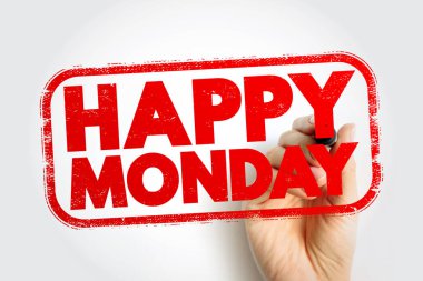 Bir el tarafından tutulan mutlu pazartesi pulu, dikdörtgen bir çerçeve içinde cesur enerjik harfler, motivasyonu temsil ediyor, haftanın olumlu başlangıcı ve işyeri ruhunu canlandırıyor