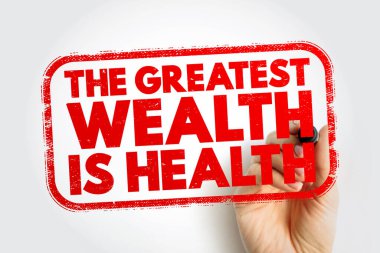 En büyük zenginlik, bir el tarafından tutulan sağlık puludur. Çerçevelenmiş bir rozette, sağlık, denge, sağlıklı yaşam ve kişisel refahın nötr bir arkaplanda vurgulandığı cesur motivasyon yazısıdır.