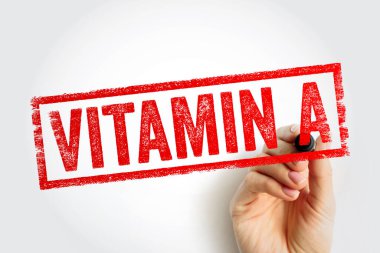 Dikdörtgen bir kenar içinde kalın kırmızı harfler oluşturan bir işareti tutan bir pul grafiği. Doku tasarımı sağlık, besin ve ek mesajları berraklıkla iletir.