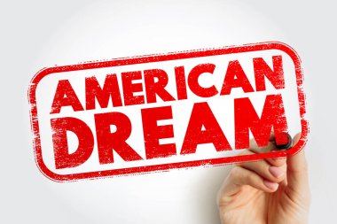 Bir el tarafından tutulan AMERİKAN DREAM damgası, dokulu bir pul efektiyle motive edici ve kültürel bir mesaj iletiyor