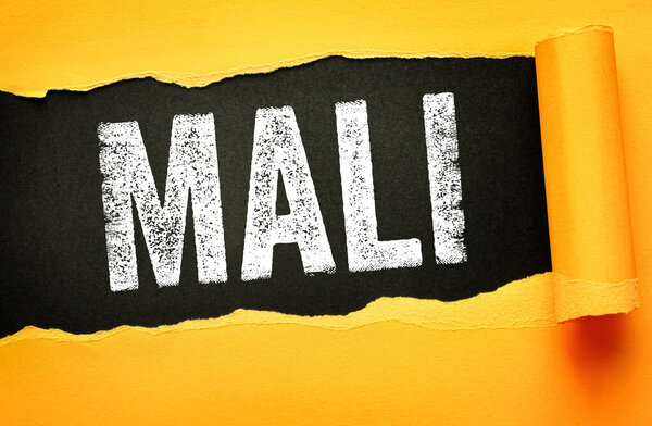 Mali country name displayed on torn paper background representing sovereignty identity security challenges and regional awareness with strong typography highlighting national presence