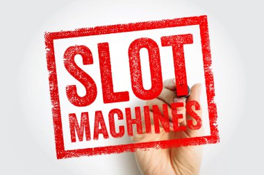 SLOT MACHINES Kauçuk bir pul kutusunda metin bir el tarafından bir kalem ile çiziliyor. Bu kavram kumarhane kumarını, oyun eğlencesini ve arka planda bahis sektörünü temsil eder.