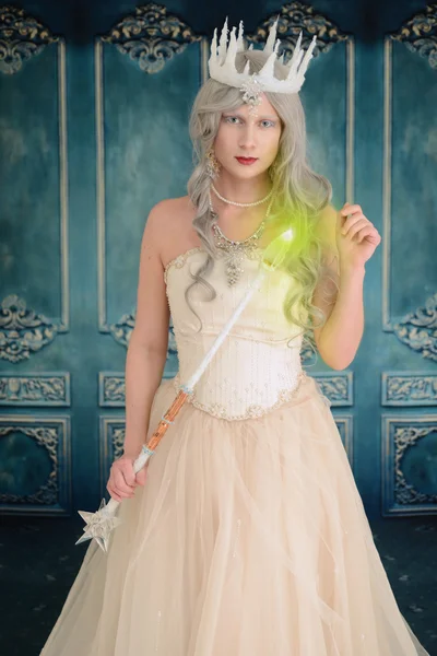 Ice queen with wand making magic — Stock Photo, Image