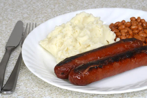 Closeup english bangers and mashed potatoes — Stock Photo, Image