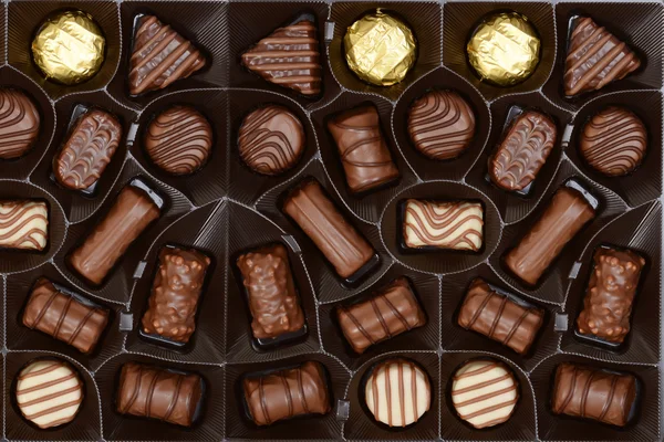 Box of chocolates background — Stock Photo, Image