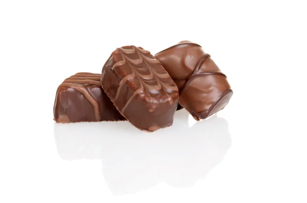 Drie melk chocolade — Stockfoto