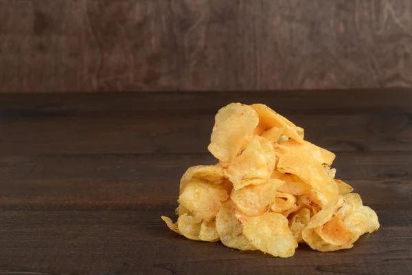 Pilha de chaleira batatas fritas cozidas — Fotografia de Stock