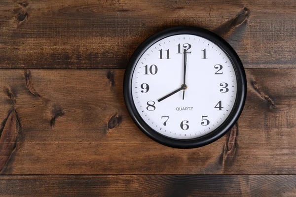 Clock on old wood — Stock Photo, Image