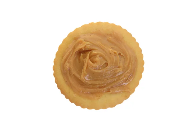 Pohled shora arašídové máslo na cracker — Stock fotografie