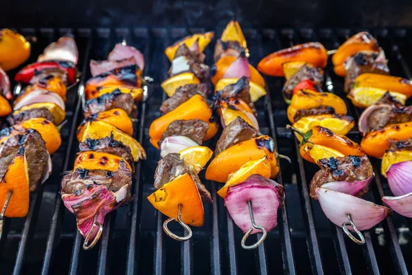 Shish kebob coocking on a grill — Stock Photo, Image