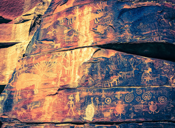 Indian petroglyphs on a rock face