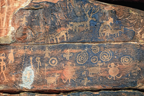 Indian petroglyphs on a rock face