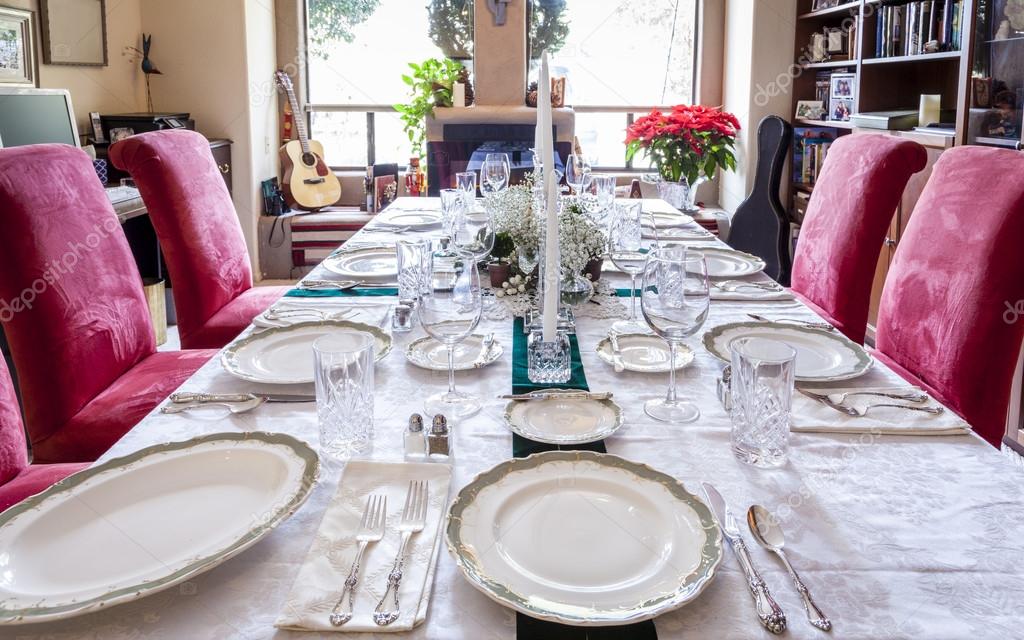 table is set for a holiday dinner
